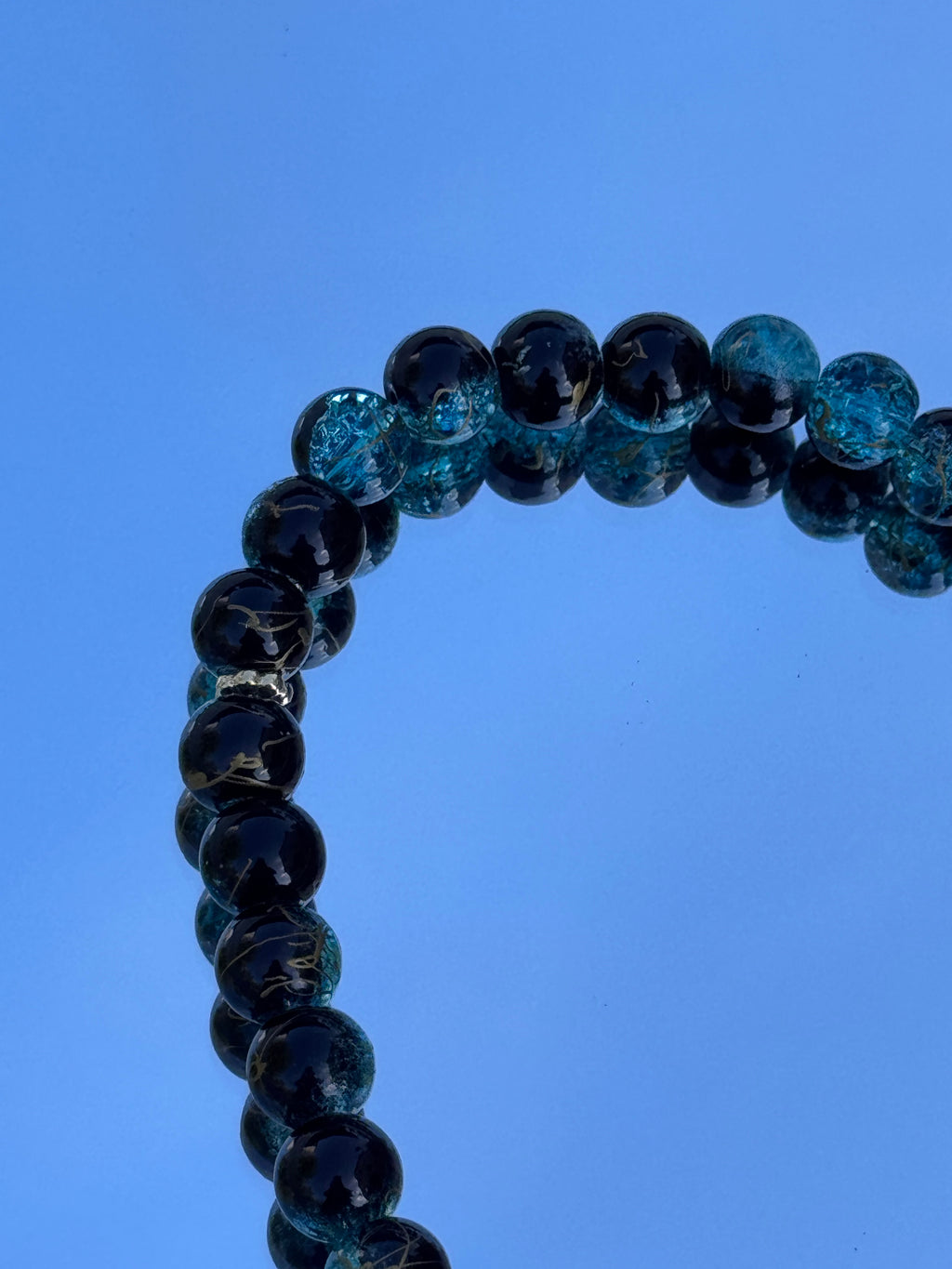 Noor Tesbih in blau-schwarz mit Golddetails