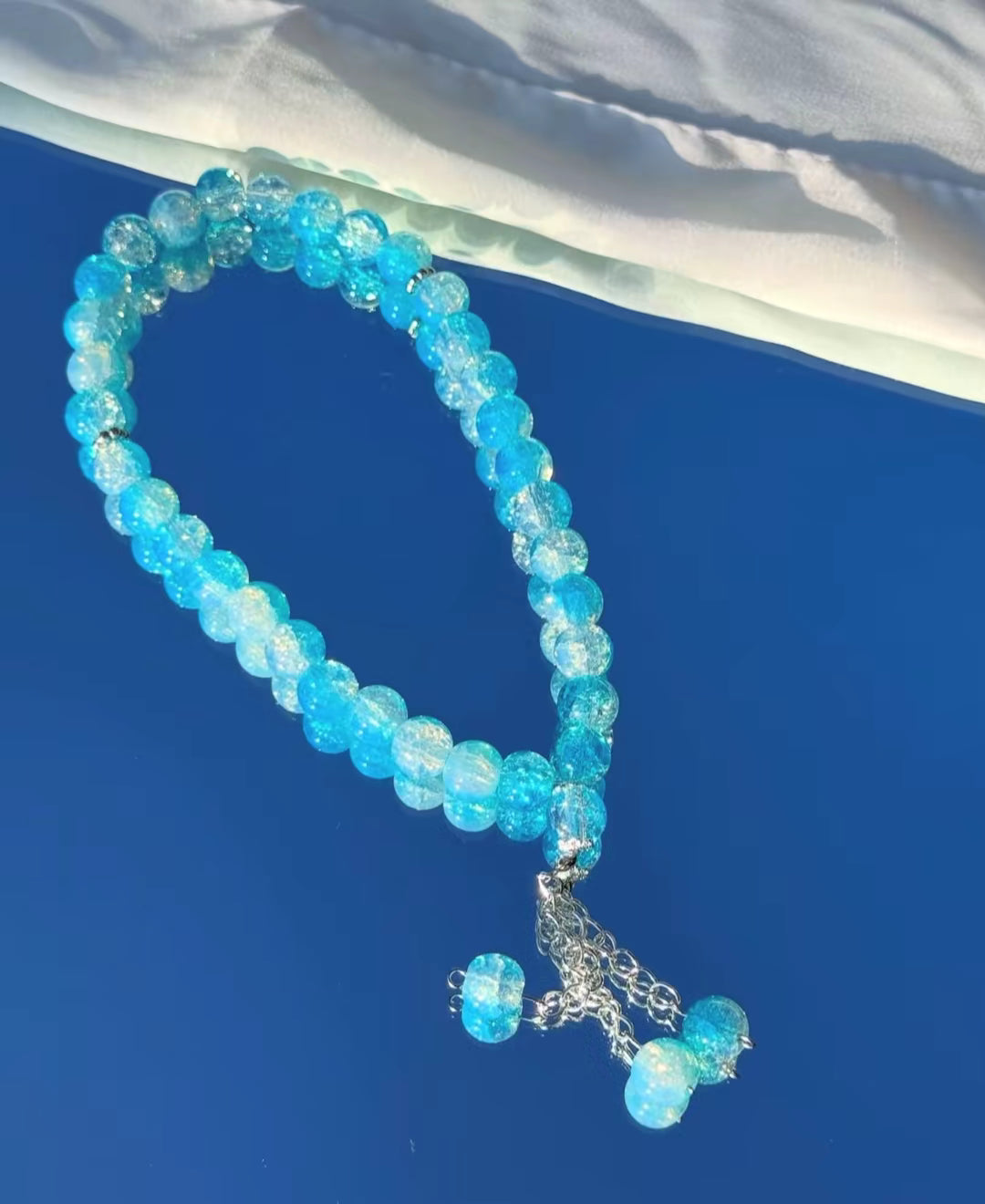 Noor Tesbih in hellblau-weiß